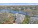 Beautiful home with a screened-in lanai overlooking a tranquil lake, enhancing outdoor living at 11910 Soft Rush Ter, Lakewood Ranch, FL 34202