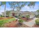 Beautiful home exterior with well-maintained lawn and landscaping at 11910 Soft Rush Ter, Lakewood Ranch, FL 34202