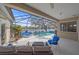 Screened-in pool area overlooking the lake at 11910 Soft Rush Ter, Lakewood Ranch, FL 34202