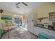 Bright home studio with painting supplies, ample natural light, and a sink with storage at 11910 Soft Rush Ter, Lakewood Ranch, FL 34202