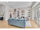 Inviting living room features a fireplace, stylish decor, and hardwood floors throughout the space at 121 N Boulevard Of Presidents, Sarasota, FL 34236