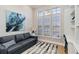 Comfortable office featuring built-in shelves, bright windows, and stylish decor at 121 N Boulevard Of Presidents, Sarasota, FL 34236