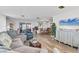 Comfortable living room featuring plush seating, stylish decor, and abundant natural light, creating a cozy and inviting space at 1210 44Th Avenue E Dr, Ellenton, FL 34222