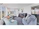 Cozy sunroom featuring comfortable seating, large windows, and ample natural light, perfect for relaxation and entertaining at 1210 44Th Avenue E Dr, Ellenton, FL 34222