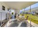 Covered patio with a seating area, offering an inviting outdoor living space at 1210 44Th Avenue E Dr, Ellenton, FL 34222