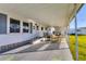 Covered patio with seating area, offering an inviting outdoor living space at 1210 44Th Avenue E Dr, Ellenton, FL 34222