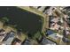 Aerial view of community homes near a pond at 12286 23Rd E St, Parrish, FL 34219