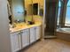 Bright bathroom boasts double sinks, soaking tub, and separate tiled shower at 12286 23Rd E St, Parrish, FL 34219