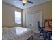 Bedroom featuring a closet, a window, a ceiling fan, and a desk area at 12286 23Rd E St, Parrish, FL 34219