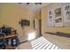 Bedroom featuring a desk and mounted TV, complete with modern decor and ample space at 12286 23Rd E St, Parrish, FL 34219