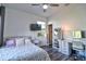 Bright bedroom featuring modern decor, a stylish vanity, and a comfortable bed, perfect for relaxation at 12286 23Rd E St, Parrish, FL 34219