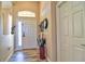 Welcoming foyer featuring a white front door and tile flooring at 12286 23Rd E St, Parrish, FL 34219