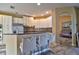 Inviting kitchen featuring bar seating and stainless steel appliances at 12286 23Rd E St, Parrish, FL 34219