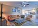 Bright living room with neutral walls and a ceiling fan at 12286 23Rd E St, Parrish, FL 34219