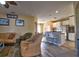 Open concept living room with a breakfast bar and barstool seating at 12286 23Rd E St, Parrish, FL 34219