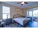 Cozy main bedroom with sliding door access to the patio at 12286 23Rd E St, Parrish, FL 34219