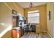 Office space featuring a desk, chair, chandelier, window, and tile floors at 12286 23Rd E St, Parrish, FL 34219