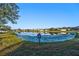 Scenic pond view in a residential community at 12286 23Rd E St, Parrish, FL 34219