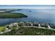 Aerial view of waterfront townhouses with beautiful bay views at 14 Tidy Island Blvd, Bradenton, FL 34210