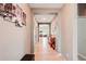 Hallway with tile floors, leading to the living area and bedrooms at 14912 Sora Way, Bradenton, FL 34212