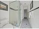 Spacious bathroom with a shower and toilet and towel rack at 1510 Lena Ln, Sarasota, FL 34240