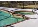 A close-up of a hot tub showing the tile details and adjacent pool area at 1510 Lena Ln, Sarasota, FL 34240