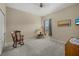 Cozy bedroom with soft carpet, ample natural light, and neutral decor at 16422 Rivers Reach Blvd, Parrish, FL 34219