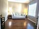 Inviting living room boasts a large window and hardwood floors at 16422 Rivers Reach Blvd, Parrish, FL 34219