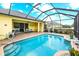 A beautiful pool with patio and screened-in enclosure offers seamless indoor-outdoor living at 16422 Rivers Reach Blvd, Parrish, FL 34219