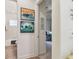 Functional bathroom adjacent a study featuring neutral tones and simple fixtures at 1911 24Th Street W Cir, Palmetto, FL 34221