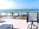 Beautiful ocean view balcony with seating area perfect for relaxation and enjoying the scenery at 2185 Gulf Of Mexico Dr # 245, Longboat Key, FL 34228