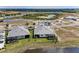 New construction single Gathering homes are situated on waterfront lots in a planned community at 260 Van Gogh Cv, Bradenton, FL 34212