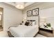 Bright bedroom featuring modern furnishings and decor, including framed horse artwork at 260 Van Gogh Cv, Bradenton, FL 34212