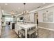 Open-concept kitchen showcasing a large island with bar seating and ample counter space at 260 Van Gogh Cv, Bradenton, FL 34212