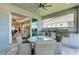 Inviting outdoor patio with dining area and built-in outdoor kitchen with a view at 260 Van Gogh Cv, Bradenton, FL 34212