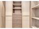 Organized closet with custom shelving and drawers for optimal storage space at 264 Van Gogh Cv, Bradenton, FL 34212
