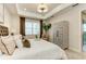 Comfortable main bedroom with decorative elements and bright natural light at 264 Van Gogh Cv, Bradenton, FL 34212