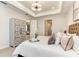 Comfortable main bedroom with decorative elements and access to ensuite bath at 264 Van Gogh Cv, Bradenton, FL 34212