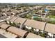 Aerial view of condo community featuring a swimming pool and tennis court at 2774 71St St Ct W # 2101, Bradenton, FL 34209
