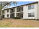 Exterior view of a condo featuring large windows and an inviting entrance at 2774 71St St Ct W # 2101, Bradenton, FL 34209