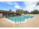Large outdoor swimming pool with lounge chairs in a condo community at 2774 71St St Ct W # 2101, Bradenton, FL 34209