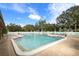 Outdoor swimming pool surrounded by lounge chairs in a condo community at 2774 71St St Ct W # 2101, Bradenton, FL 34209