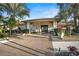 Inviting community center entrance with landscaping and easy access at 279 Park Forest Blvd, Englewood, FL 34223
