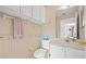 Bathroom with toilet and sink at 29353 Princeville Dr, San Antonio, FL 33576