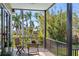 Relaxing balcony offering lush green views of the property at 310 79Th Nw St, Bradenton, FL 34209