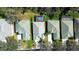 Overhead view of the property and the nearby homes, showing their lush landscaping and well-kept yards at 3116 Woodland Fern Dr, Parrish, FL 34219