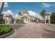 Elegant gated community entrance with meticulously landscaped surroundings and a welcoming atmosphere at 3116 Woodland Fern Dr, Parrish, FL 34219