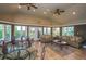Bright and airy clubhouse featuring comfortable seating, stylish decor, and ample natural light at 4008 Crockers Lake Blvd # 11, Sarasota, FL 34238