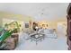Inviting living space with plush sofas, soft carpeting, and an open layout leading to other areas of the home at 4050 Oakhurst Dr # 3175, Sarasota, FL 34233