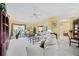 Bright and airy living room featuring neutral tones, plush carpeting, and ample natural light at 4050 Oakhurst Dr # 3175, Sarasota, FL 34233